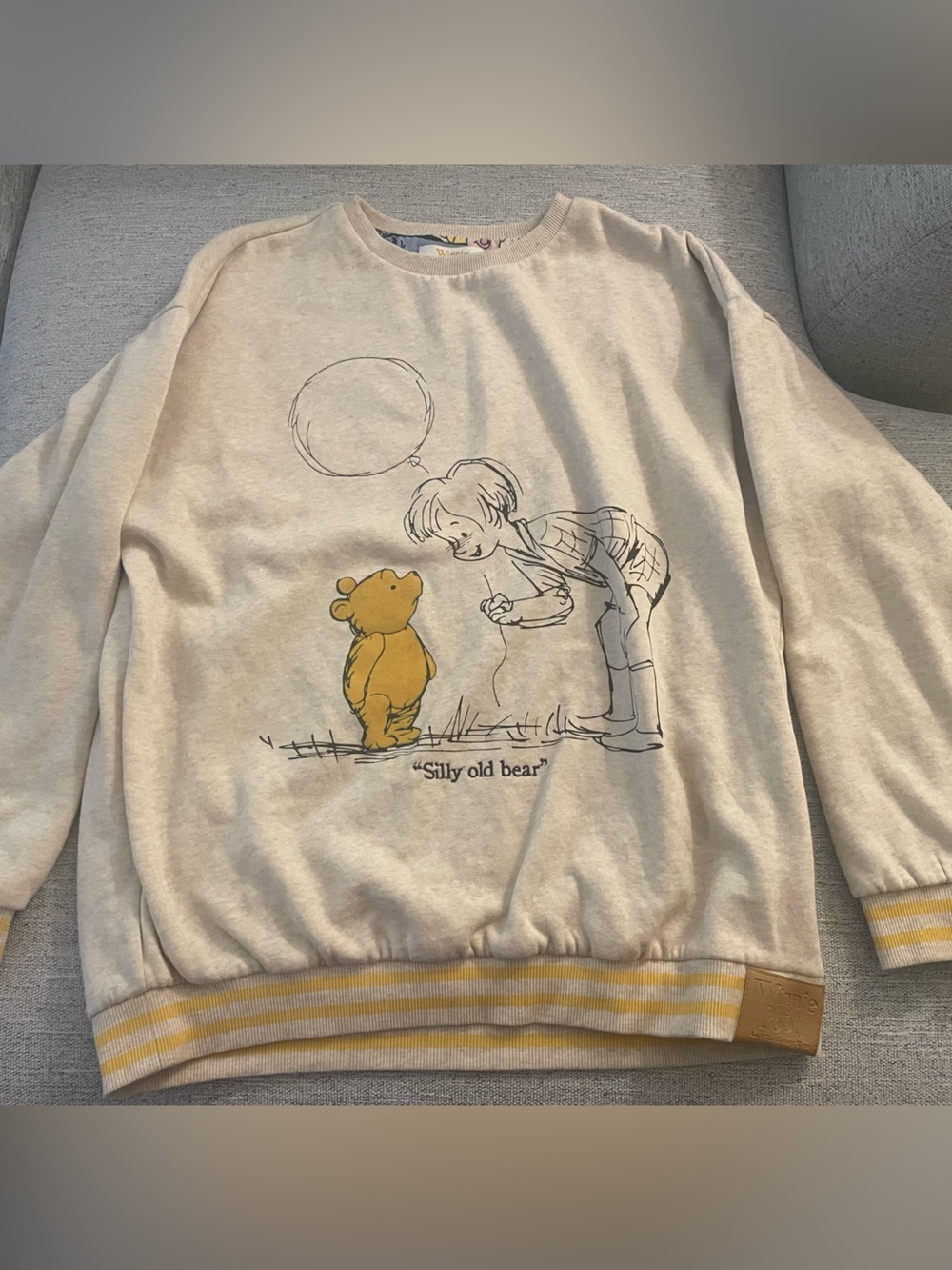 Winnie the Pooh Graphic Sweatshirt in Cream & Yellow reversible! Size small NWT